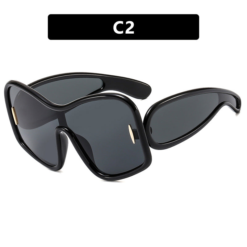 Women’s futuristic sunglasses with extra wide design and protective UV filter Stornfield