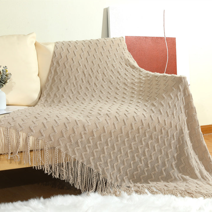 Women’s knitted blanket with textured wave pattern Stornfield