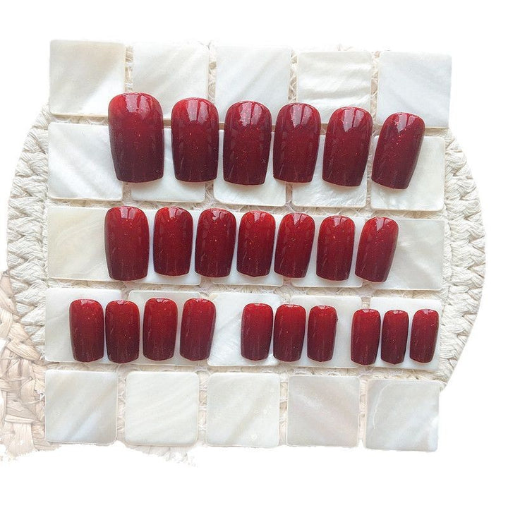 Artificial nails with intense shine and glitter accents Stornfield