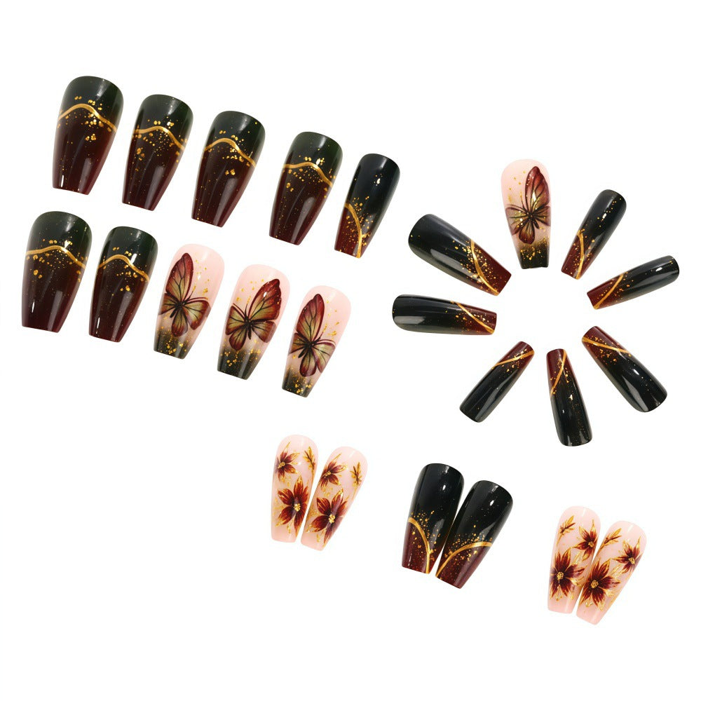 Artificial nails with elaborate butterfly and flower designs Stornfield