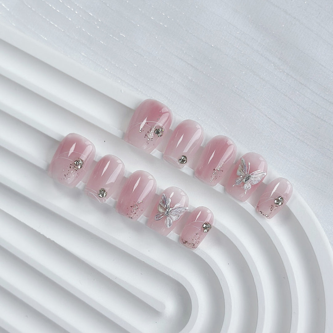 Elegant Press-On Nail Art Set with Butterfly and Gem Embellishments