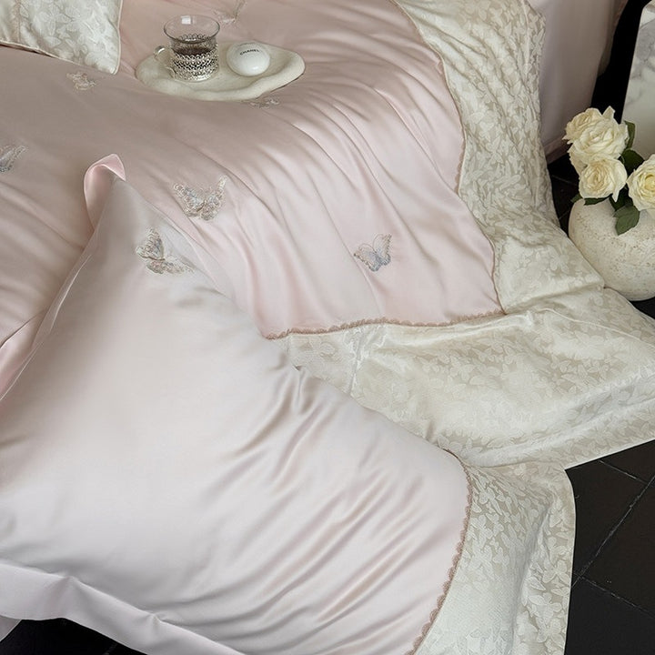 Luxurious cotton satin bedding set with butterfly embroidery and tie band pillow