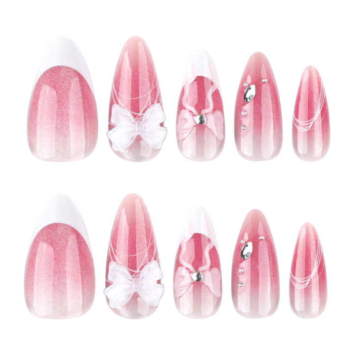 Artful acrylic nails with floral design and glitter embellishment Stornfield