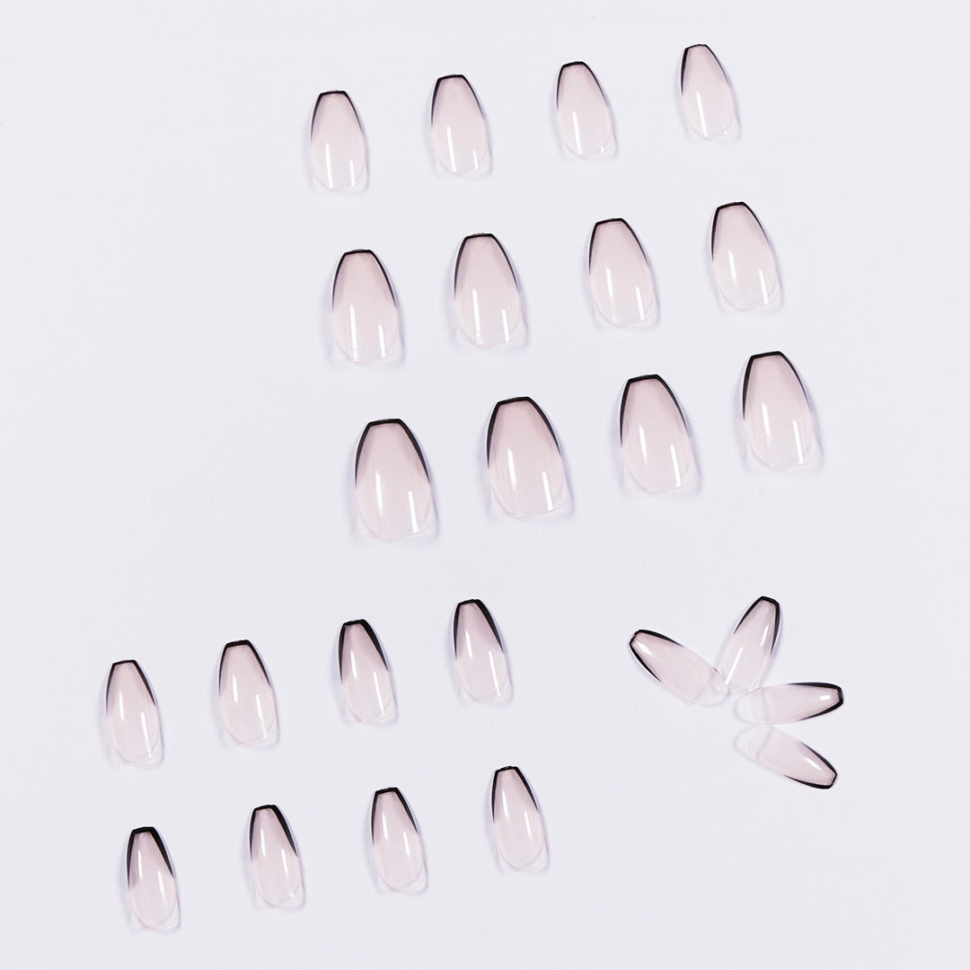 Artful stiletto nails with elegant black tip decoration Stornfield