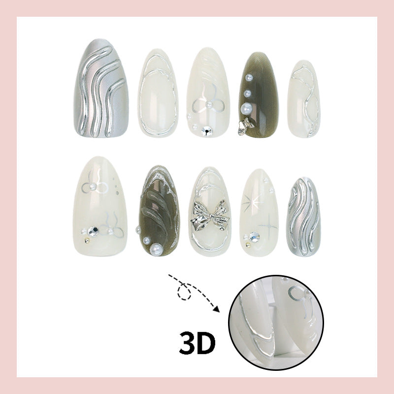 Nail set with luxurious 3D decorations and elegant stone accents Stornfield
