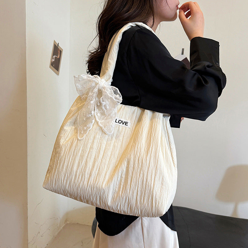 Leisure bag with structured design and playful scarf Stornfield
