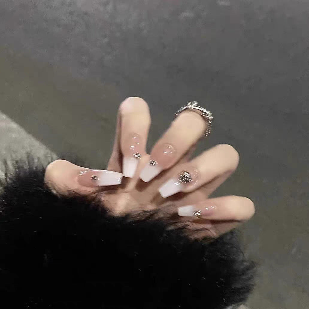 Elegant Acrylic Nail Extensions with Rhinestone Accents