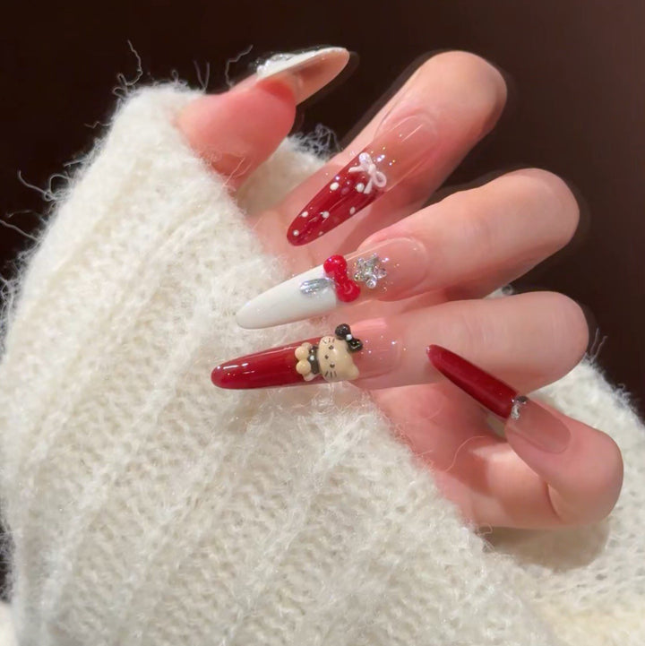 Artistic Stiletto Press-On Nail Art with Glimmering Accents Stornfield