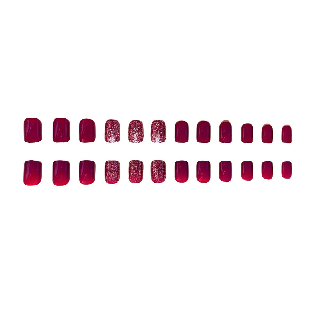 Glossy Press-On Nail Extensions with Glitter Stornfield