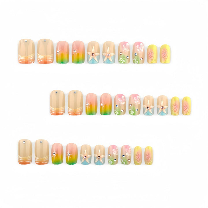 Acrylic nails with floral accents and gradient Stornfield