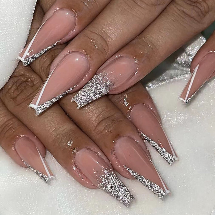 Artful stiletto nails with glitter and French tip Stornfield