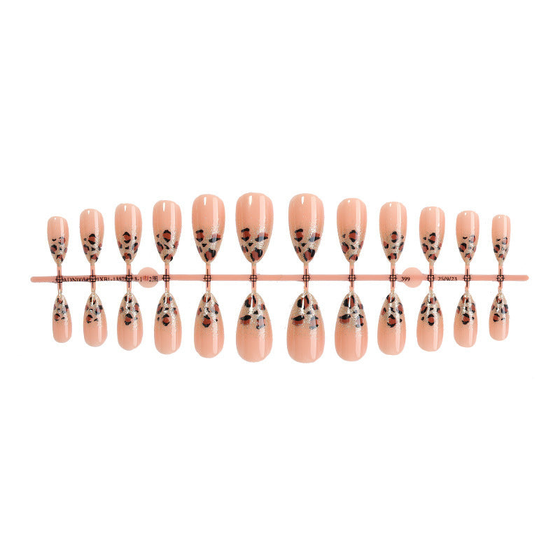 Nail art set with elegant leopard pattern and glitter accents Stornfield