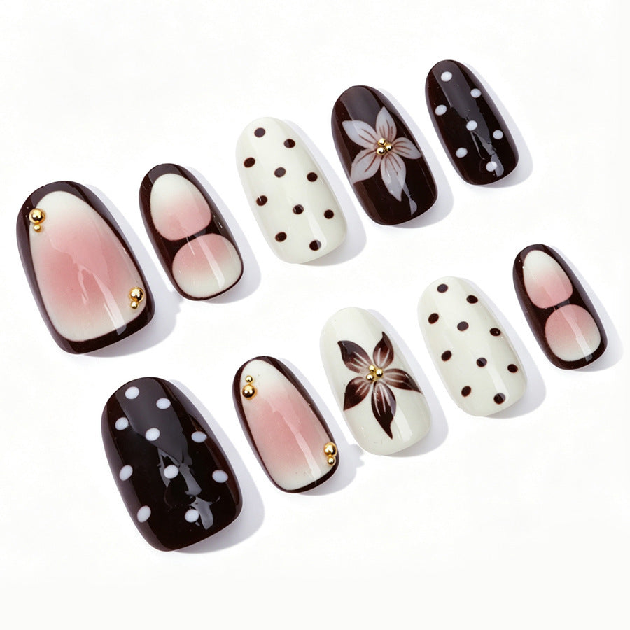 Acrylic nail set with floral accents and elegant design Stornfield