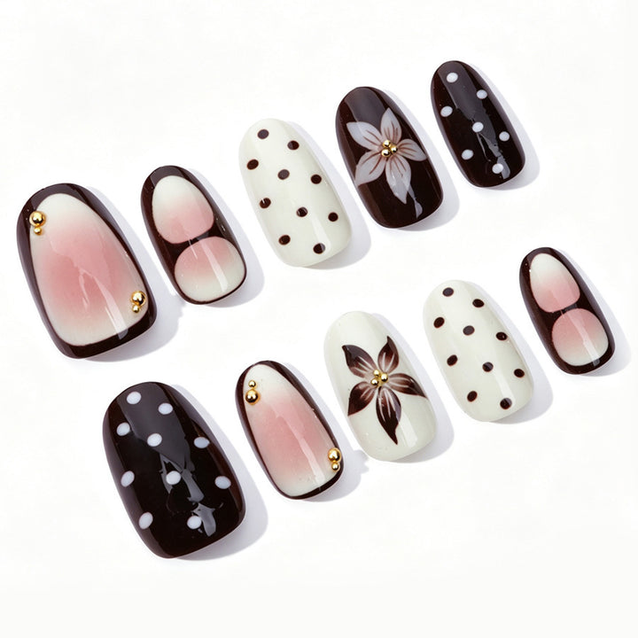 Acrylic nail set with floral accents and elegant design Stornfield