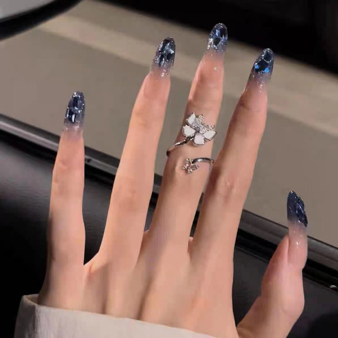 Artificial nails in creative moon and star design Stornfield