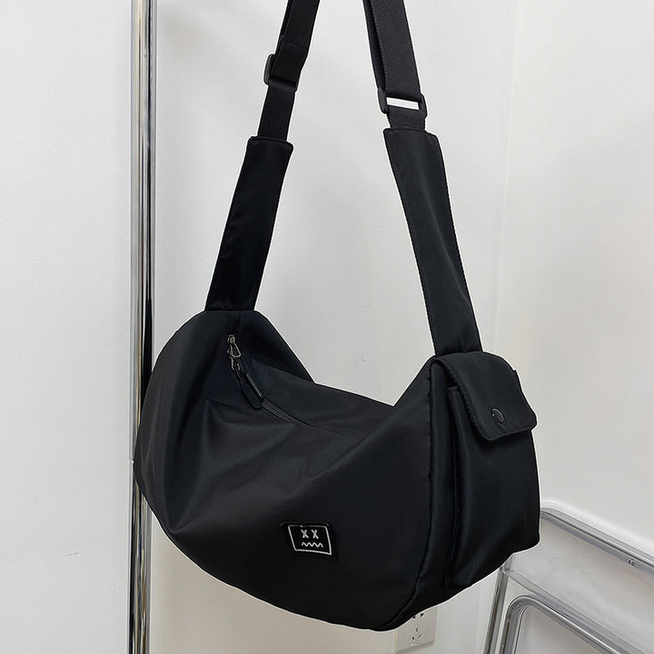 Sporty shoulder bag with adjustable carrying strap Stornfield