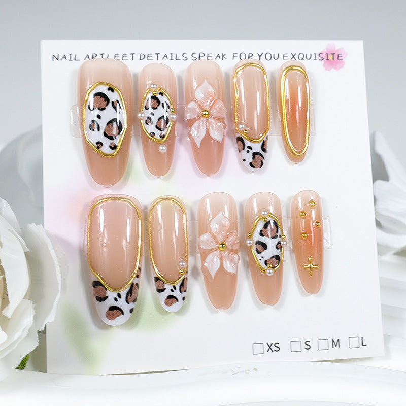 Nail art set with floral and animal accents Stornfield