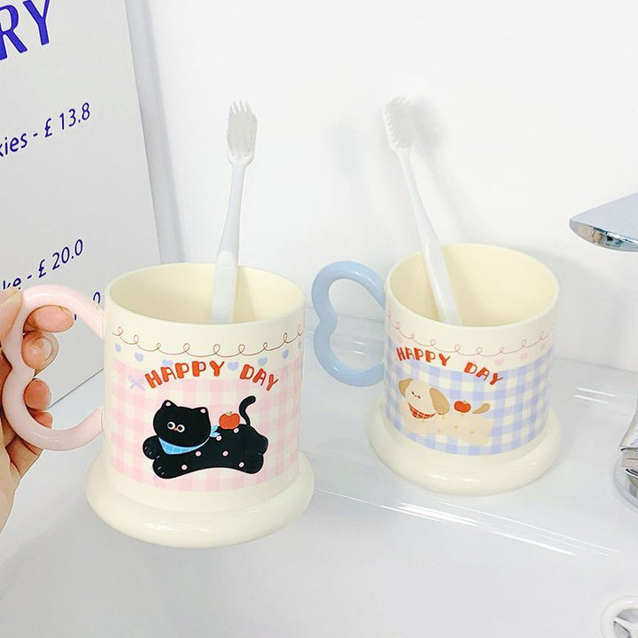 Ceramic mug with playful puppy motif Stornfield