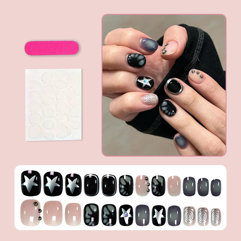 Artificial nail set with creative star and glitter designs Stornfield