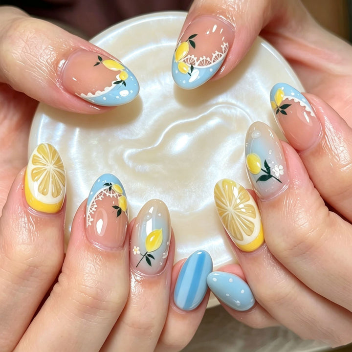Artificial nail set with cheerful citrus and flower motifs Stornfield