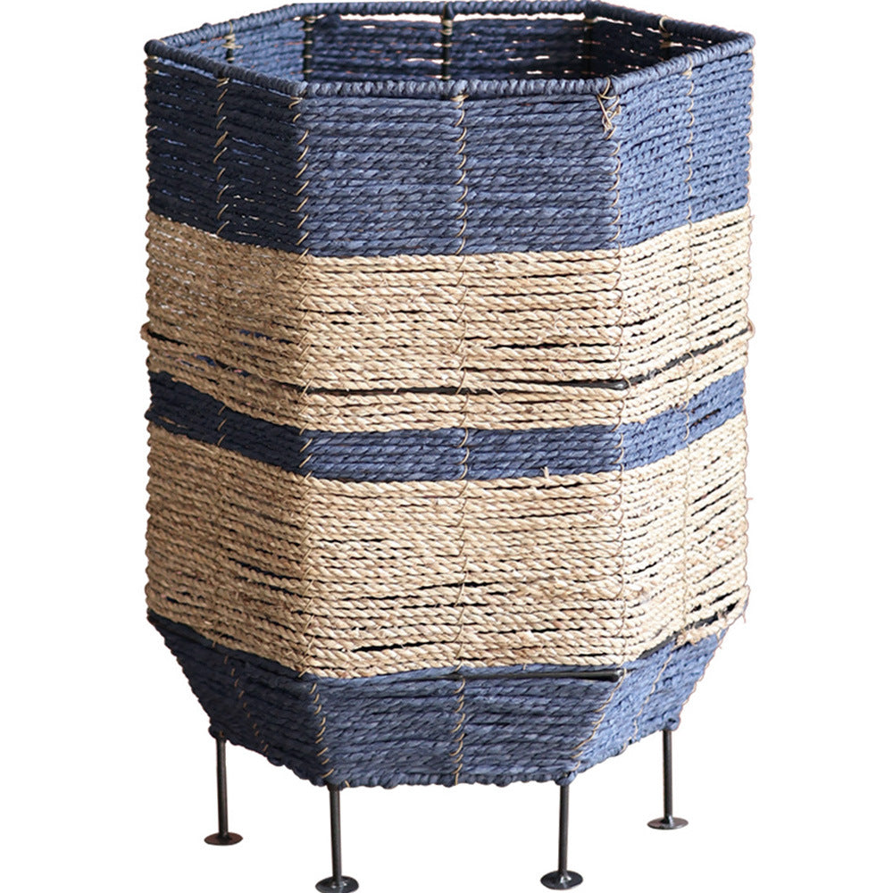 Stylish laundry basket made of rattan with metal legs Stornfield