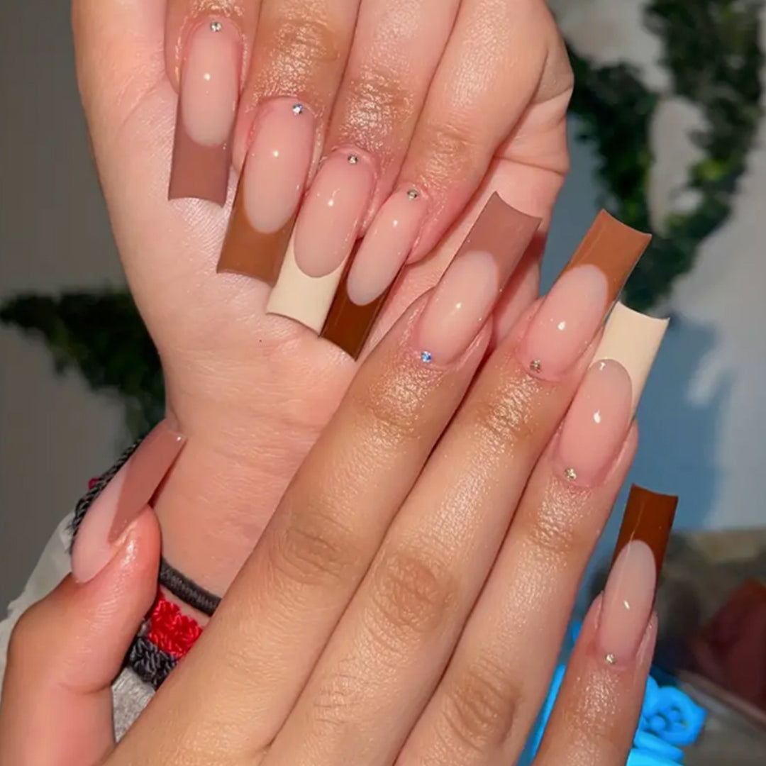 Glamorous artificial nails with rhinestone highlights Stornfield