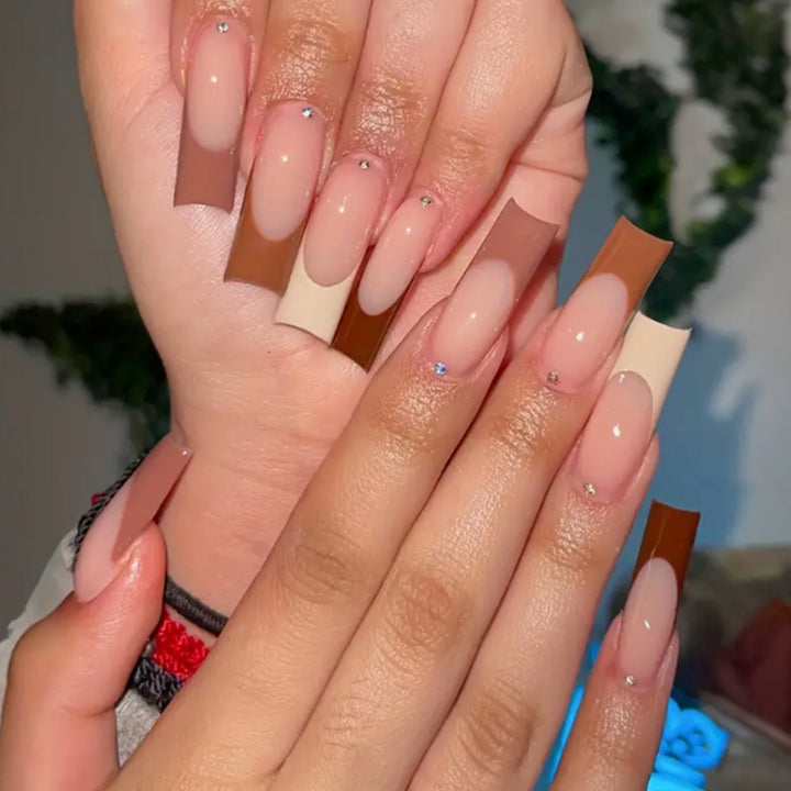 Glamorous artificial nails with rhinestone highlights Stornfield