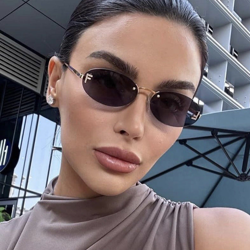Women's fashionable sunglasses with elegant, round lenses and delicate metal frame Stornfield
