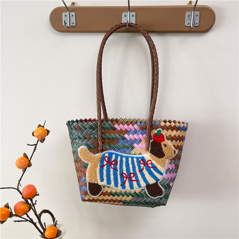 Shoulder bag with playful dog motif Stornfield