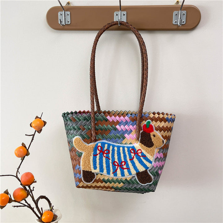 Shoulder bag with playful dog motif Stornfield