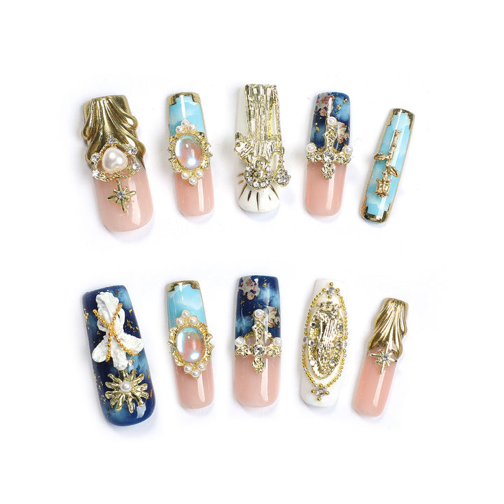 Elegant artificial nails with glamorous embellishments Stornfield
