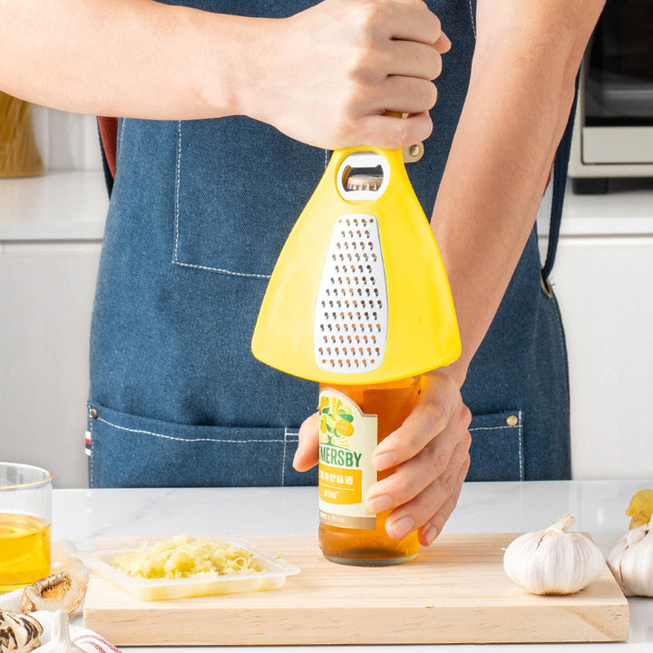 Multifunctional kitchen grater with integrated bottle opener function Stornfield