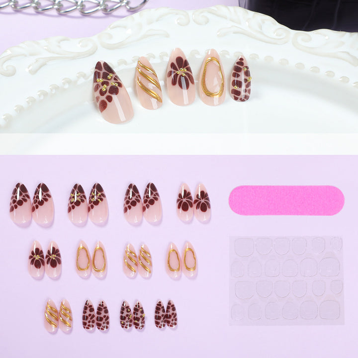 Artificial nail set with elegant flower and gold accents Stornfield