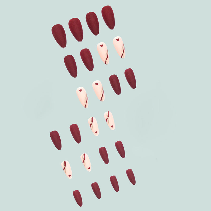 Artful and elegant artificial nails with heart decorations Stornfield