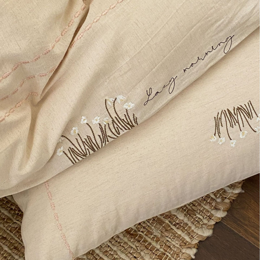 Stonewashed Organic Cotton Duvet Cover Set with Embroidered Pillow Shams and Pintuck Detail