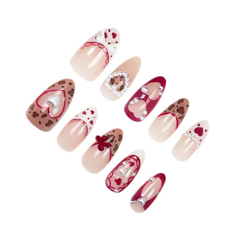Nail set with romantic heart and bow decorations Stornfield