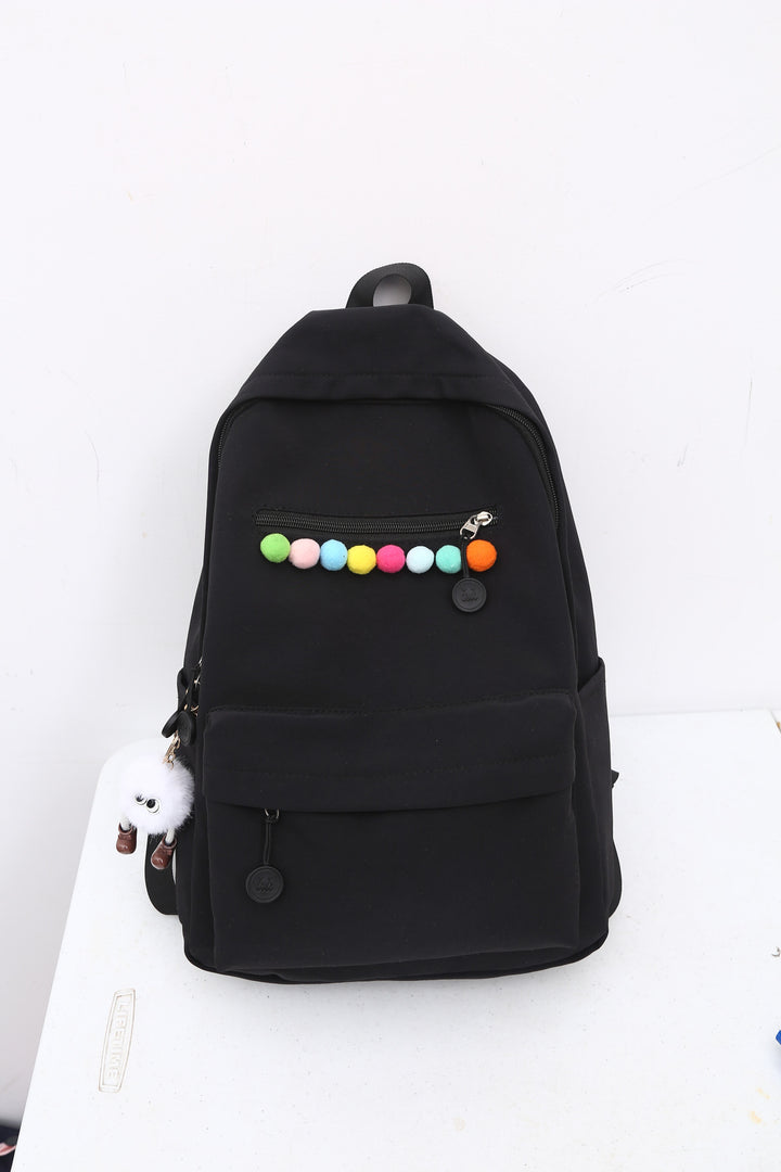 Practical backpack with colorful applications Stornfield