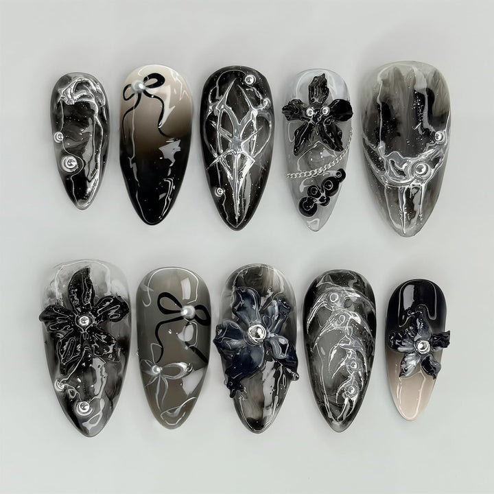 Elegant acrylic nail set with complex designs Stornfield