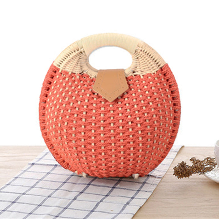 Round straw bag with elegant leather handle Stornfield