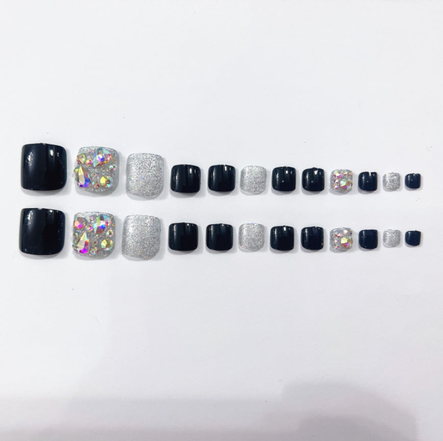 Glamorous toenails with sparkling rhinestones Stornfield
