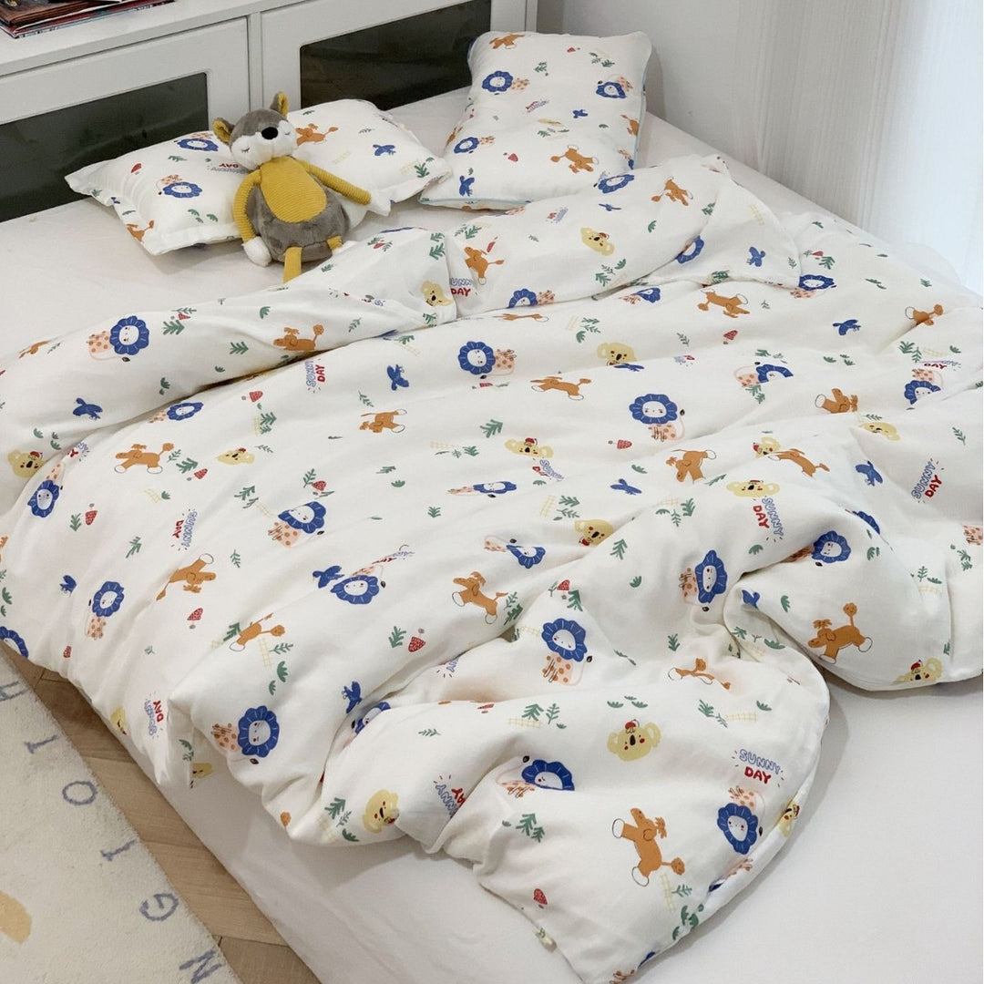 Kids bedding set with cute lion motifs made of soft cotton muslin