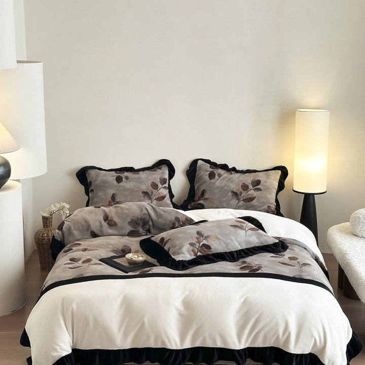 Plush bedding set made of faux fur with cow print design and contrasting ruffles