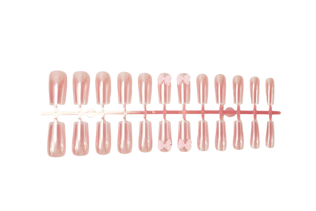 Artificial nail set with stylish bows and elegant French tips Stornfield