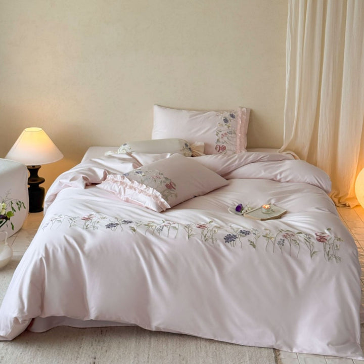 Embroidered duvet cover set with fine floral trim and soft satin feel