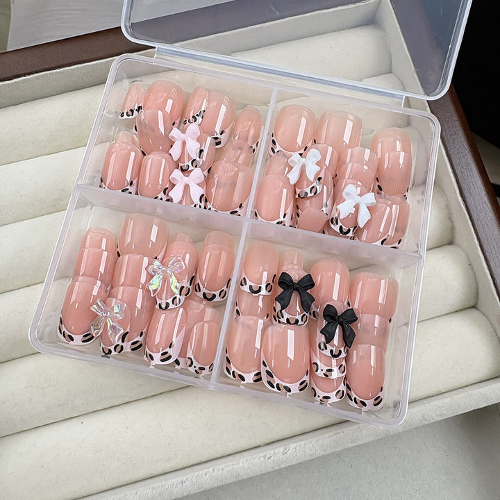 Artistic Press-On Nail Set with Bow Accents Stornfield