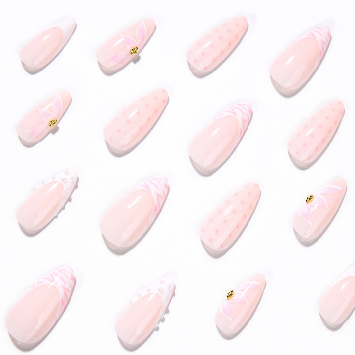 Artistic stiletto nails with elegant 3D decorations Stornfield