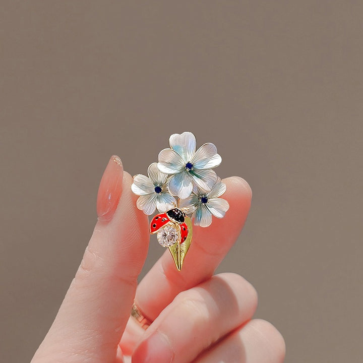 Flower brooch with ladybug and crystal Stornfield