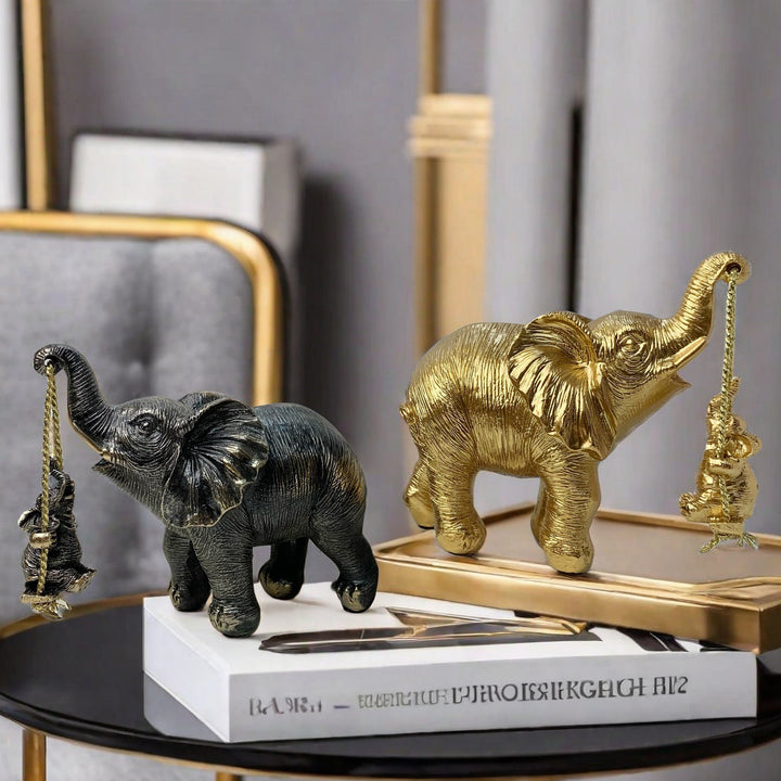 Decorative elephant figure with child Stornfield