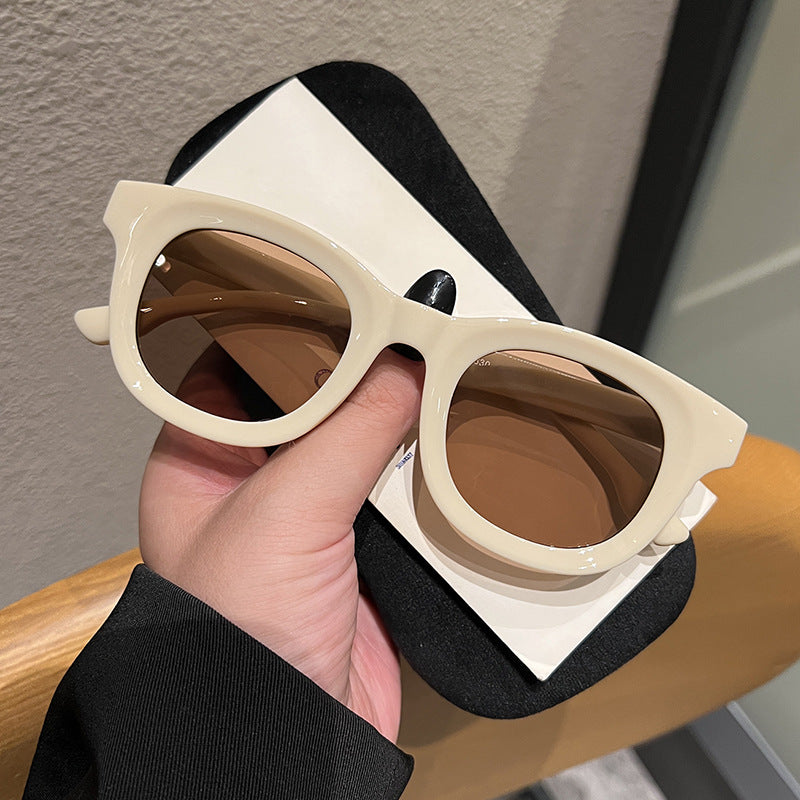 Women's stylish round sunglasses with sturdy frame and protective UV filter Stornfield