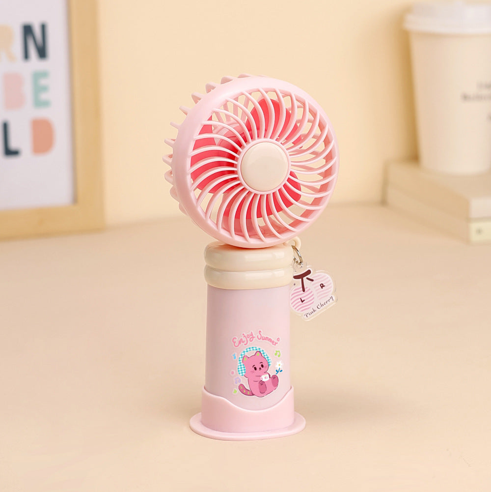Ladies wearable handheld fan with playful dog design Stornfield